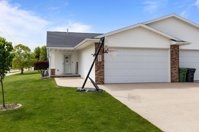 1308 Lavender Ln, Appleton, WI 54915 - view of front of property featuring driveway, a garage, a shingled roof, and a front yard
