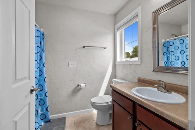 1308 Lavender Ln, Appleton, WI 54915 - full bathroom featuring vanity, toilet, tile patterned floors, and baseboards