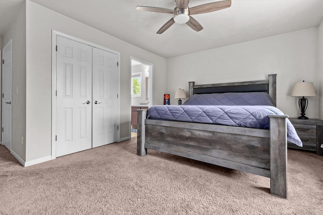 1308 Lavender Ln, Appleton, WI 54915 - bedroom with carpet, a ceiling fan, a closet, baseboards, and ensuite bath