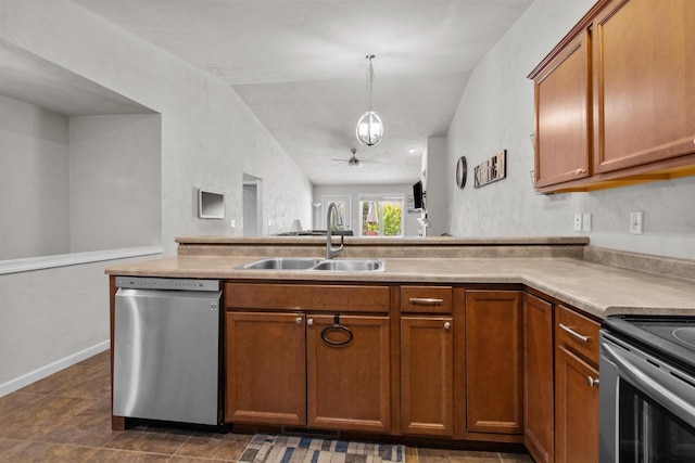 1308 Lavender Ln, Appleton, WI 54915 - kitchen with stainless steel dishwasher, a sink, brown cabinetry, ceiling fan, and a peninsula