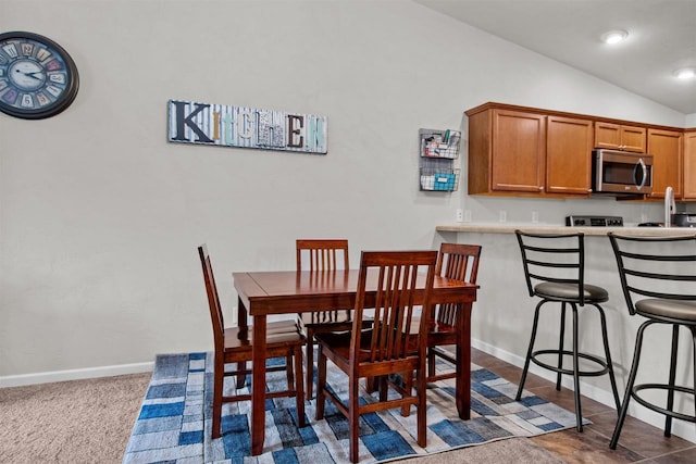 1308 Lavender Ln, Appleton, WI 54915 - dining area featuring lofted ceiling and baseboards