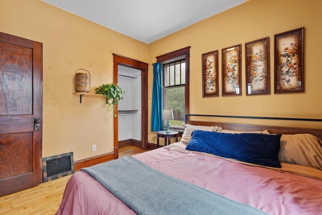 224 E Atlantic St, Appleton, WI 54911 - bedroom featuring wood finished floors and baseboards