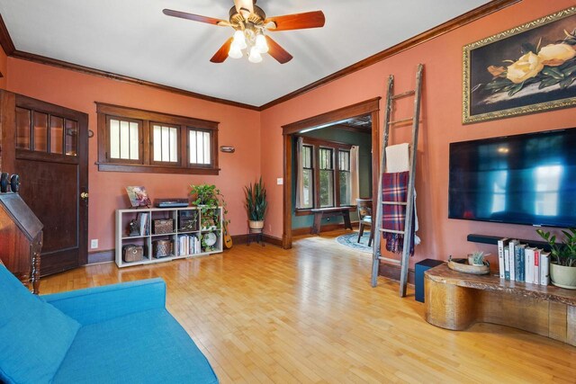 224 E Atlantic St, Appleton, WI 54911 - living area featuring wood finished floors, crown molding, a ceiling fan, and baseboards