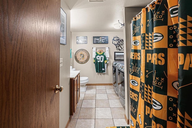 W7009 Crestwood Ln, Fond Du Lac, WI 54937 - full bathroom with independent washer and dryer, tile patterned floors, vanity, toilet, and a shower with curtain