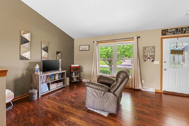W7009 Crestwood Ln, Fond Du Lac, WI 54937 - living room with wood finished floors, lofted ceiling, and baseboards