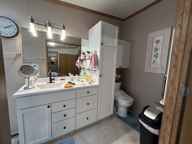 715 Oak St, Shawano, WI 54166 - bathroom featuring ornamental molding, vanity, and toilet