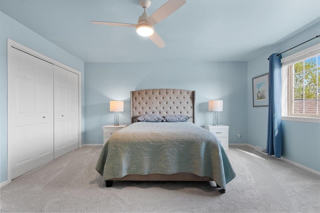 1243 Pond View Cir, De Pere, WI 54115 - carpeted bedroom featuring baseboards, a closet, and ceiling fan