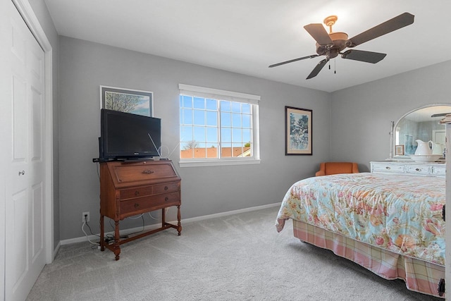 1243 Pond View Cir, De Pere, WI 54115 - carpeted bedroom with baseboards, a ceiling fan, and a closet