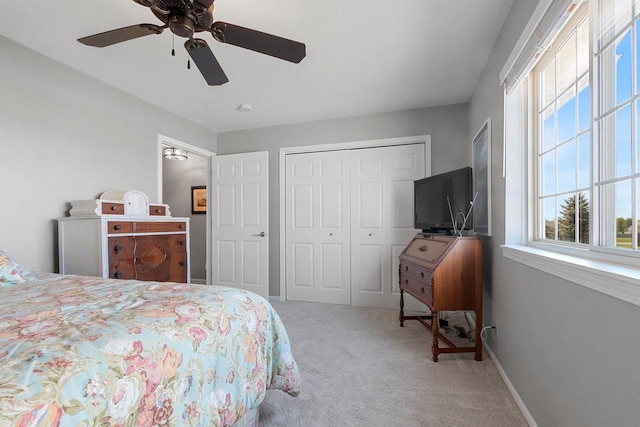 1243 Pond View Cir, De Pere, WI 54115 - carpeted bedroom featuring multiple windows, a closet, and ceiling fan