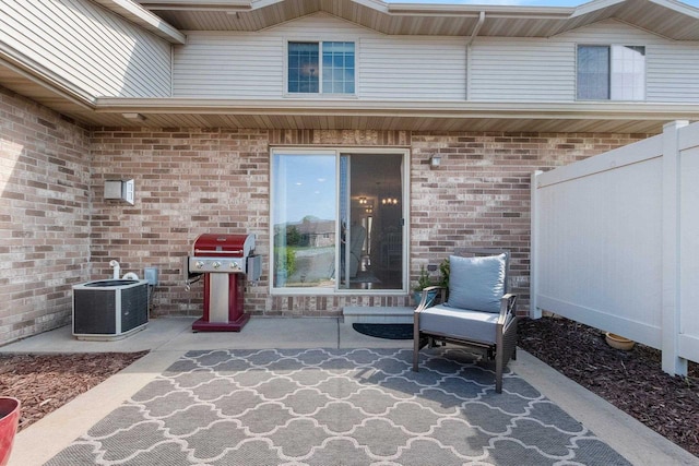 1243 Pond View Cir, De Pere, WI 54115 - view of patio featuring cooling unit and a grill
