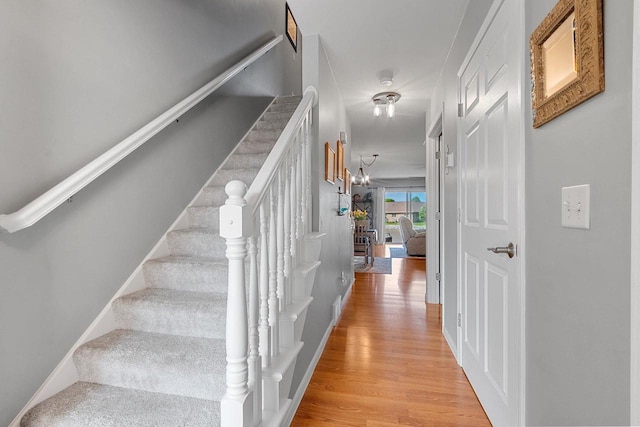 1243 Pond View Cir, De Pere, WI 54115 - stairway with wood finished floors