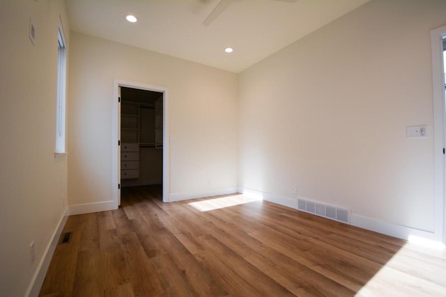 4200 E Lake Vista Blvd, Oak Creek, WI 53154 - spare room featuring wood finished floors, baseboards, and recessed lighting