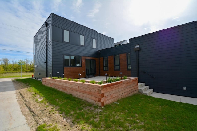 4200 E Lake Vista Blvd, Oak Creek, WI 53154 - back of property featuring a patio