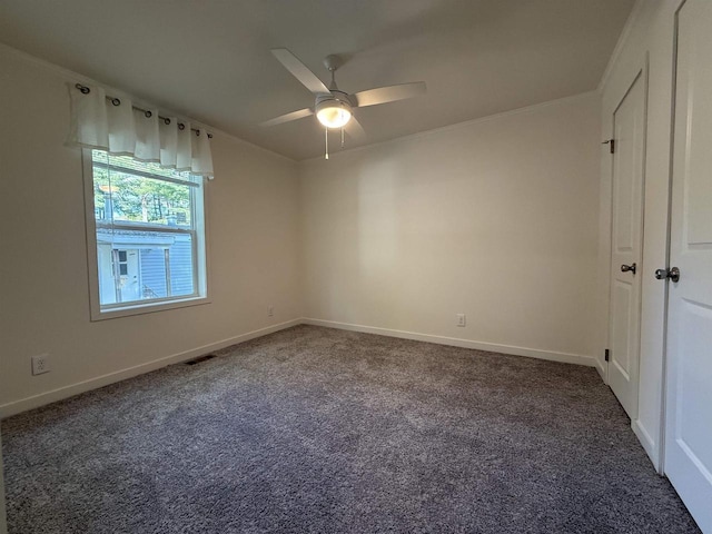 731 Sunset Blvd Unit 29, Wisconsin Dells, WI 53965 - carpeted empty room with ceiling fan, baseboards, and ornamental molding