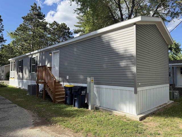 731 Sunset Blvd Unit 29, Wisconsin Dells, WI 53965 - view of home's exterior featuring central AC unit