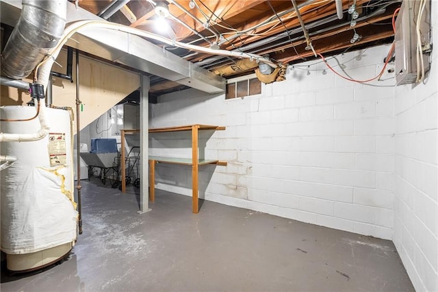 623 Starr Ave, Eau Claire, WI 54703 - unfinished basement featuring water heater and concrete block wall