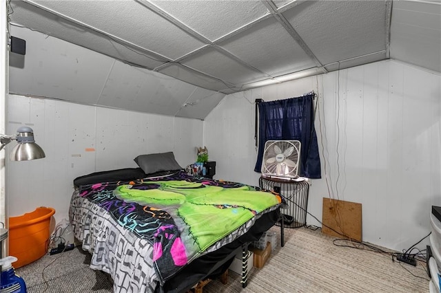 623 Starr Ave, Eau Claire, WI 54703 - carpeted bedroom with lofted ceiling and wood walls