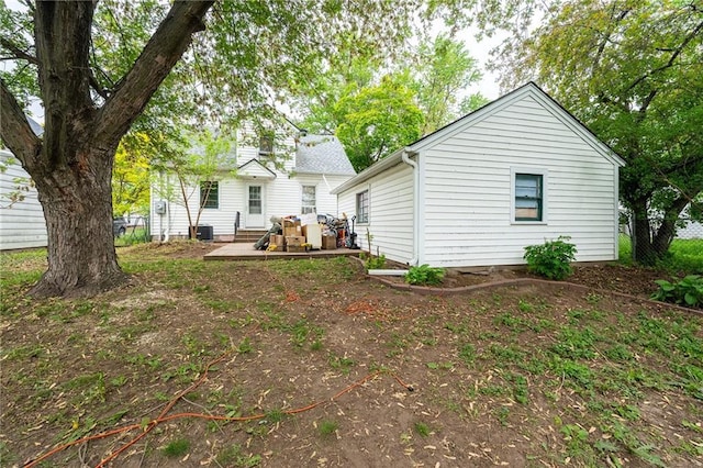 623 Starr Ave, Eau Claire, WI 54703 - back of property with central AC unit and a patio area