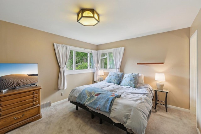 219 Summit St, Portage, WI 53901 - carpeted bedroom featuring baseboards