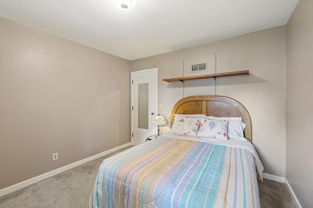 219 Summit St, Portage, WI 53901 - bedroom with carpet flooring and baseboards