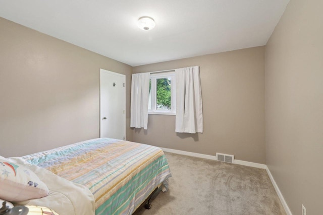 219 Summit St, Portage, WI 53901 - carpeted bedroom featuring baseboards