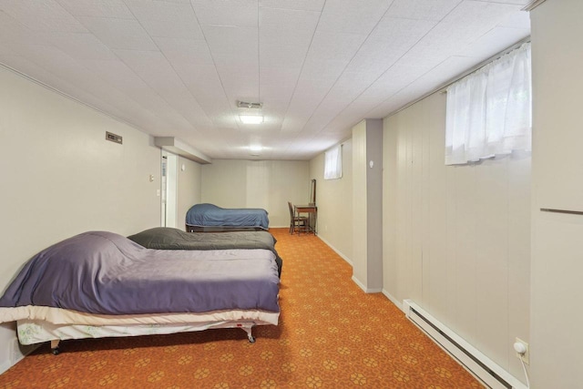 219 Summit St, Portage, WI 53901 - carpeted bedroom featuring baseboard heating