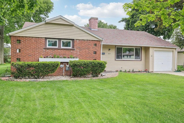 219 Summit St, Portage, WI 53901 - single story home featuring a chimney, a front yard, a garage, brick siding, and driveway