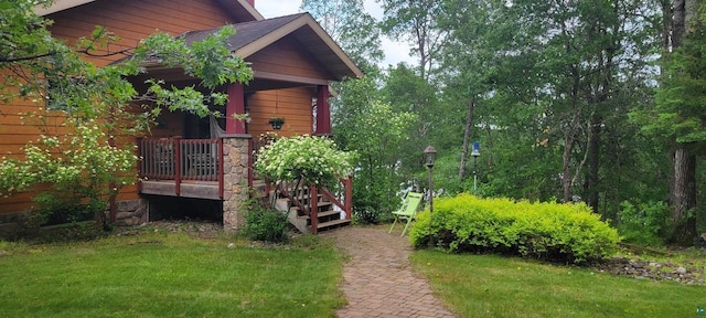 10115 E Island Lake Rd, Solon Springs, WI 54873 - view of home's exterior with a lawn