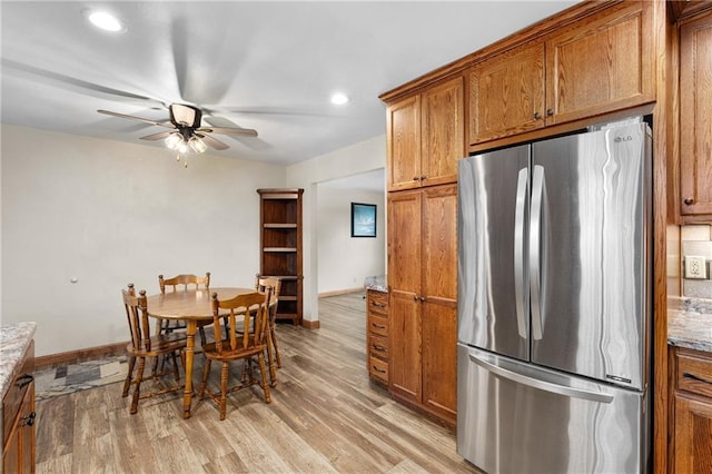 12924 Thomas St, Osseo, WI 54758 - dining space with a ceiling fan, light wood-type flooring, baseboards, and recessed lighting