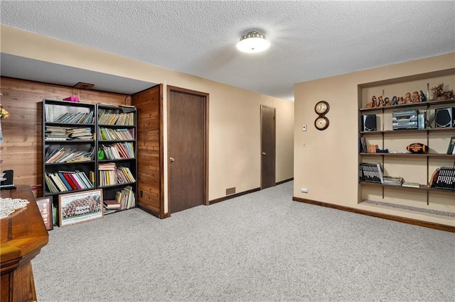 12924 Thomas St, Osseo, WI 54758 - corridor featuring carpet, a textured ceiling, and baseboards