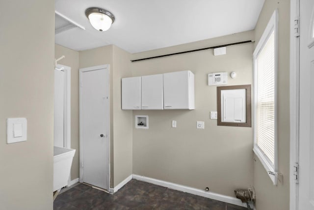 6170 N 36th St, Milwaukee, WI 53209 - washroom featuring cabinet space, hookup for a washing machine, plenty of natural light, and baseboards