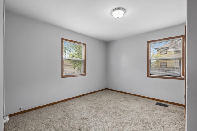 6170 N 36th St, Milwaukee, WI 53209 - unfurnished room featuring carpet floors and baseboards