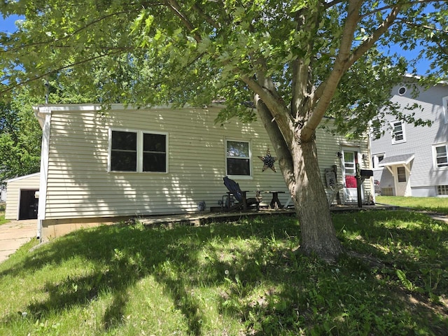 605 Monroe St, Fort Atkinson, WI 53538 - obstructed view of property with an outdoor structure