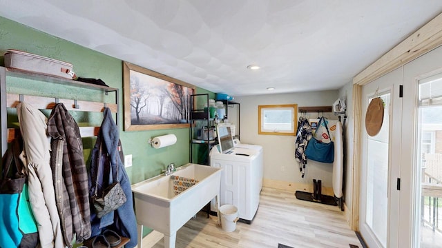 605 Monroe St, Fort Atkinson, WI 53538 - laundry room featuring washer / clothes dryer, wood finished floors, healthy amount of natural light, recessed lighting, and baseboards
