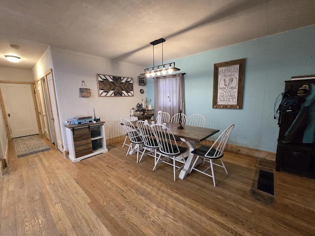 605 Monroe St, Fort Atkinson, WI 53538 - dining area with wood finished floors and baseboards