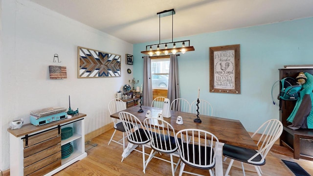 605 Monroe St, Fort Atkinson, WI 53538 - dining room with light wood finished floors and baseboards