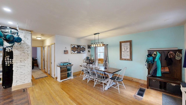 605 Monroe St, Fort Atkinson, WI 53538 - dining room featuring wood finished floors and baseboards