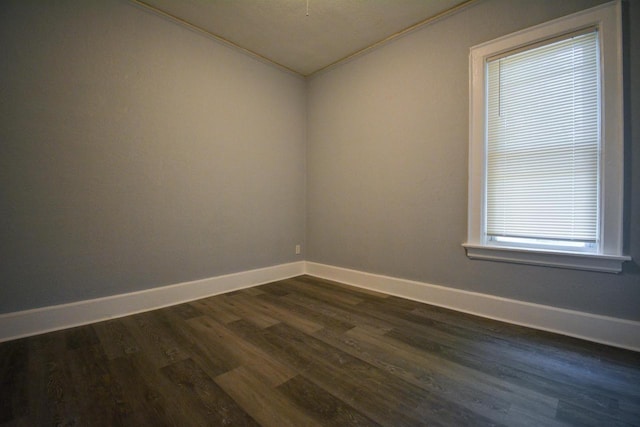 116 E Concordia Ave, Milwaukee, WI 53212 - unfurnished room featuring dark wood-style floors, baseboards, crown molding, and vaulted ceiling