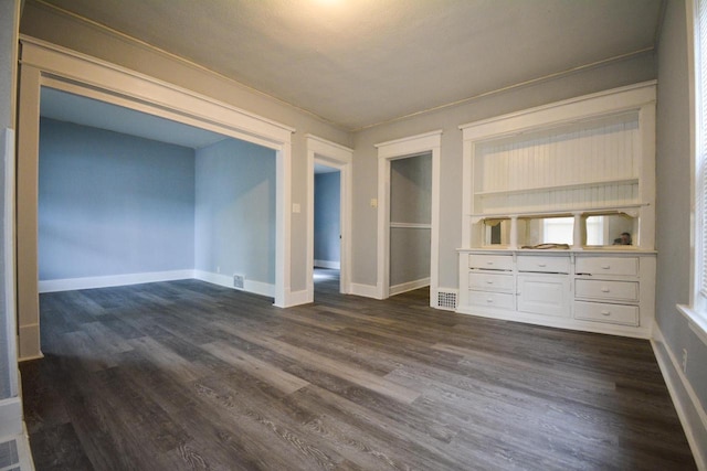 116 E Concordia Ave, Milwaukee, WI 53212 - spare room featuring dark wood-style flooring, baseboards, and ornamental molding