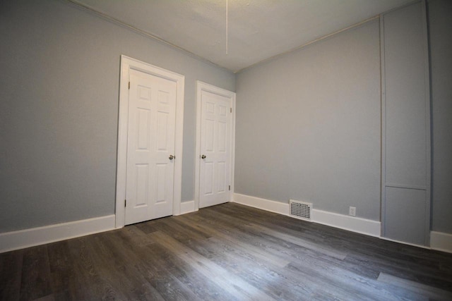 116 E Concordia Ave, Milwaukee, WI 53212 - unfurnished room featuring dark wood-style floors and baseboards