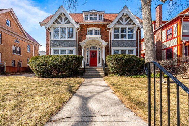 2615 N Summit Ave, Milwaukee, WI 53211 - view of front of home with brick siding and a front lawn