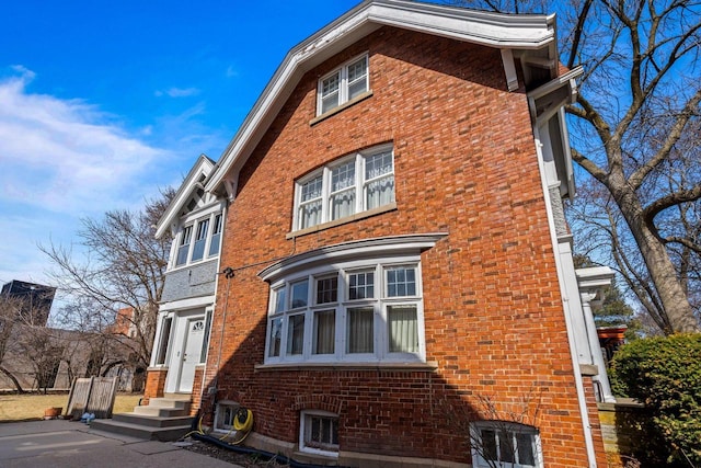 2615 N Summit Ave, Milwaukee, WI 53211 - view of side of home with brick siding and entry steps