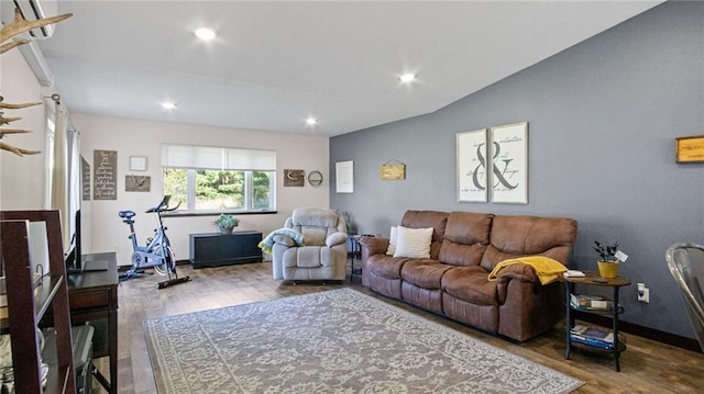 18925 63rd Ave Unit A1, Chippewa Falls, WI 54729 - living area with wood finished floors, recessed lighting, and vaulted ceiling