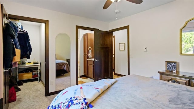 18925 63rd Ave Unit A1, Chippewa Falls, WI 54729 - bedroom with light carpet and a ceiling fan