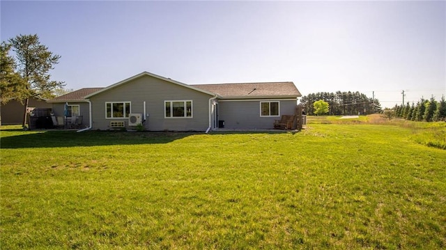 18925 63rd Ave Unit A1, Chippewa Falls, WI 54729 - back of house with a yard and ac unit