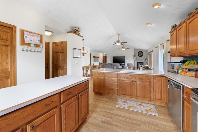 W9555 Zimmerman Dr, Beaver Dam, WI 53916 - kitchen with dishwasher, open floor plan, ceiling fan, vaulted ceiling, and light countertops