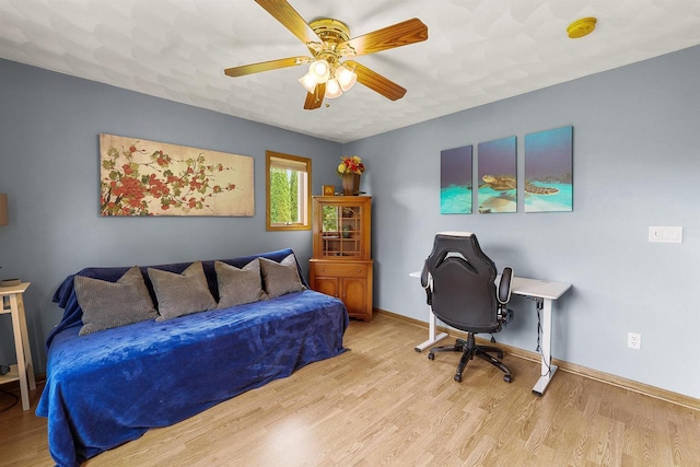 W9555 Zimmerman Dr, Beaver Dam, WI 53916 - bedroom featuring wood finished floors, baseboards, and a ceiling fan
