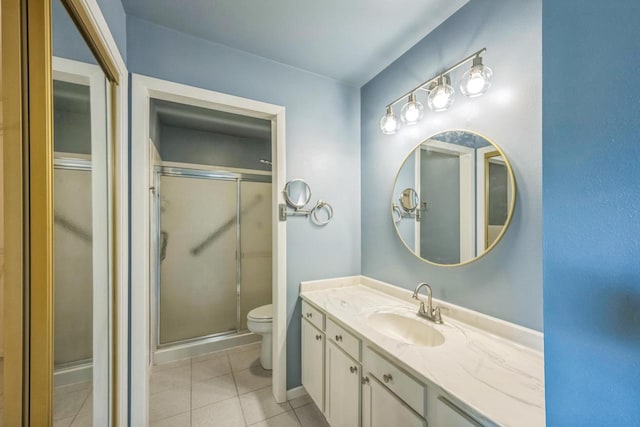 1402 Wheeler Rd Unit A, Madison, WI 53704 - bathroom with toilet, a shower stall, vanity, and tile patterned flooring