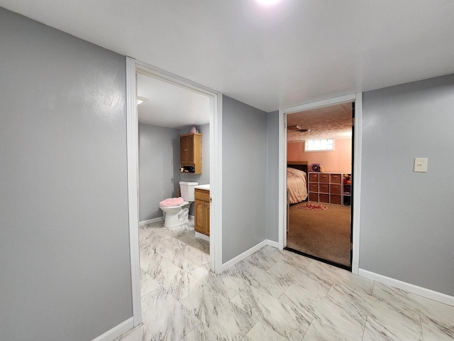 1130 10th St S, Wisconsin Rapids, WI 54494 - hall featuring light marble finish floors and baseboards