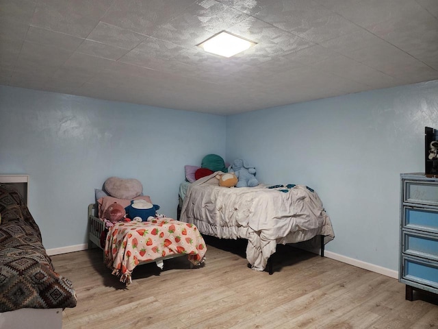 1130 10th St S, Wisconsin Rapids, WI 54494 - bedroom with wood finished floors and baseboards